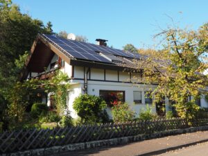 A house with rooftop solar panels 